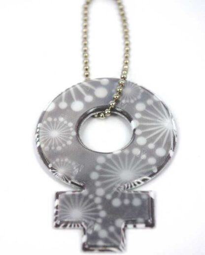 Refleks Kvinnesymbol hengerefleks sort/hvitt